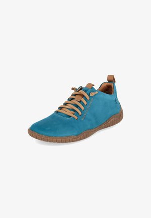 Chaussure décontractée couleur sarcelle avec lacets, semelle marron, languette au talon et détails cousus sur le côté.