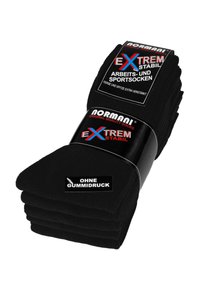 Schwarze Arbeits- und Sportsocken mit verstärkten Fersen und Zehen. Mit einem Etikett, das "ohne Gummidruck" anzeigt. Weiche Textur, gestapelte Anordnung.