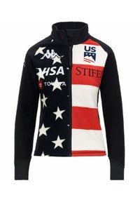Giacca in fleece di colore navy, rosso e bianco, con motivo a stelle, chiusura con zip e diversi loghi, tra cui quelli di US e Visa.