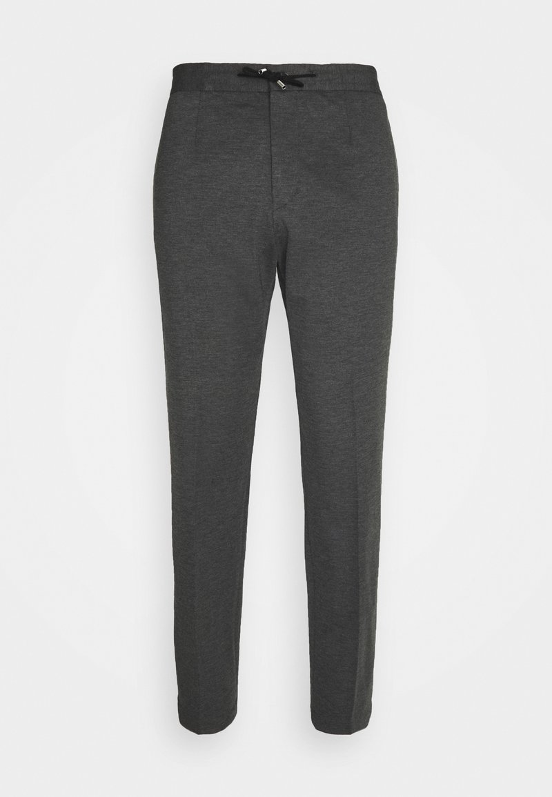 Pantalon de survêtement gris foncé coupe slim avec taille élastique et cordon noir, présenté sur un fond blanc.