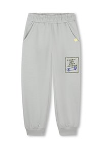 Lichtgrijze joggingbroek van zachte stof, met een verstelbare tailleband, zijzakken en een geborduurd label met tekst en grafische details.