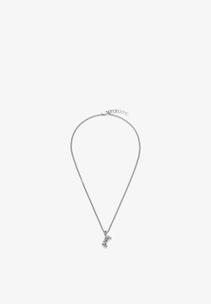 Silberne Halskette mit einer kleinen, detaillierten Anhänger in Form eines Spielecontrollers, der in der Mitte hängt.