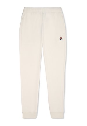 Pantalones de chándal color crema con cinturilla elástica, puños y bolsillos laterales. Presenta un pequeño logo de color en la cadera izquierda.