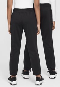 Nike Performance WINTER - Treniņtērpa apakšdaļas - black black white