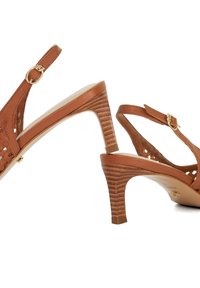 Brown leather slingback sandals with cut-out design, adjustable strap, and a textured, stacked heel. Classic style with minimalist accents.