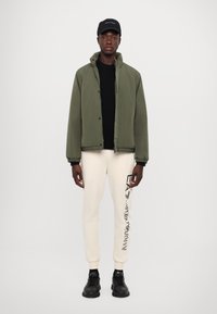 EA7 Emporio Armani GIUBBOTTO UNISEX - Lahka jakna - beetle
