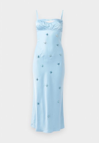 Light blue satin dress with thin straps, a gathered bust, and embellished with star-shaped sequins in varying sizes across the fabric.