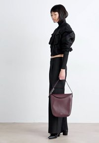 Calvin Klein SOFT SCULPT BUCKET BAG - Bolso de mano - oxblood