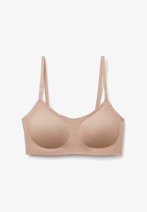 Beiger nahtloser, gepolsterter BH mit dünnen verstellbaren Schultergurten und weichem Stoff, entworfen für Komfort und den täglichen Gebrauch.