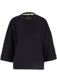 Sweat-shirt noir surdimensionné avec un col rond, des poignets et un ourlet côtelés. Présente un petit logo sur la manche. Texture de tissu douce.