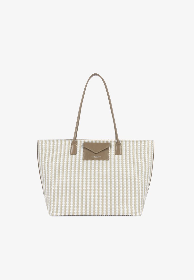Sac cabas tissé beige et blanc avec de longues poignées en cuir brun clair et une petite poche avant en cuir portant l'inscription "Lancaster Paris".