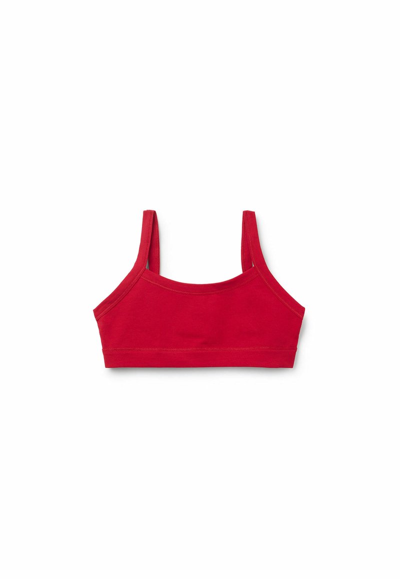Červený bavlněný bralette s tenkými ramínky, bezšitým designem a hladkým povrchem. Bez zapínání a bez kostic, vhodný pro pohodlné nošení.