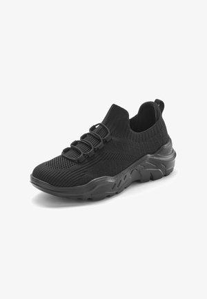 Black athletic shoe with a knitted upper, slip-on design, textured sole, and elastic lacing system. Cushioning around the ankle for support.