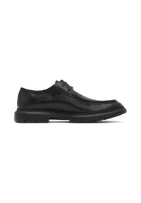 Scarpe in pelle nera con una finitura liscia, punta arrotondata, due occhielli per i lacci e una suola testurizzata. Leggere con un design a profilo basso.