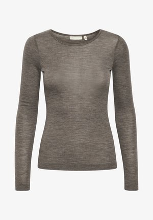 Langarm shirt van zacht, lichtbruin materiaal. Heeft een ronde halslijn en een aangesloten silhouet. Subtiele textuur met een klein logo detail.