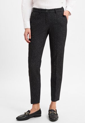 Tailored black herringbone trousers with a slim fit, featuring a front button closure, belt loops, and side pockets. Textured woven fabric.
