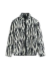 Veste en fausse fourrure avec un motif de rayures zèbre noir et blanc, dotée d'une fermeture éclair sur le devant et d'un col montant, fabriquée à partir d'un matériau doux et texturé.