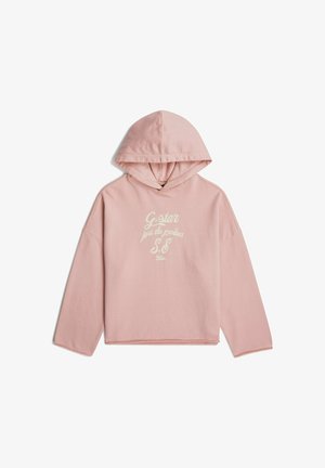 Jasnoróżowa bluza z kapturem, długimi rękawami i białym kursywowym napisem z przodu: "G-star just the product S.E Dior."