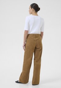 Kaffe WIDE - Trousers - toasted coconut