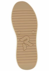 Semelle en caoutchouc beige avec un motif strié. Présente un grand logo en relief et des marquages de taille près du talon. Détails de bord blancs.