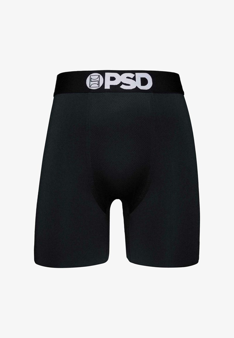 Boxer-briefs noirs en tissu extensible, avec une ceinture à logo. Le design est simple avec une texture lisse et sans motifs visibles.