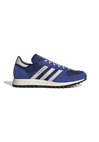 Modré a bílé tenisky Adidas TRX Vintage s třemi bílými pruhy, šedými tkaničkami a texturovanou černou podrážkou, boční pohled na bílém pozadí.