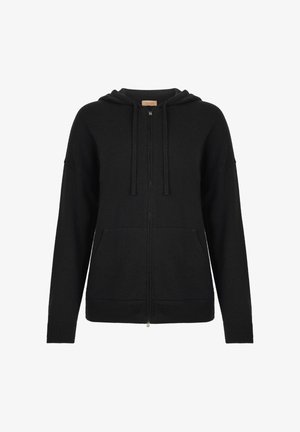 Schwarze Zip-Hoodie aus weichem Stoff, mit Kapuze, gerippten Bündchen, zwei vorderen Taschen und einem dezenten Reißverschlussdetail am Saum.