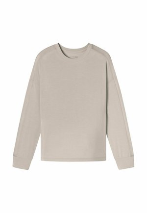 Light beige long-sleeve shirt made of soft fabric, featuring a round neckline and relaxed fit with dropped shoulder seams and ribbed cuffs.