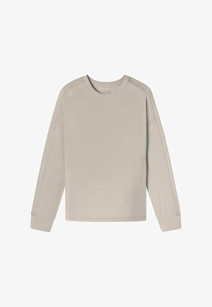 Light beige long-sleeve shirt made of soft fabric, featuring a round neckline and relaxed fit with dropped shoulder seams and ribbed cuffs.