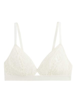 Soutien-gorge bralette en dentelle blanche avec fines bretelles réglables et large bande sous la poitrine, présentant un motif de dentelle florale sur les bonnets.