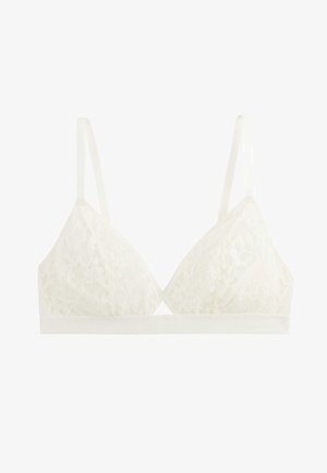 Soutien-gorge bralette en dentelle blanche avec fines bretelles réglables et large bande sous la poitrine, présentant un motif de dentelle florale sur les bonnets.