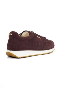 Suede maroon sneaker with a white midsole and gum outsole. Features rounded toe, lace-up design, and a small gold accent on the heel.