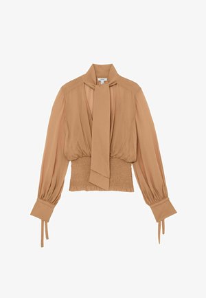 Bluză bej cu mâneci lungi, talie adunată, manșete largi cu șnururi, decolteu adânc în V și detaliu cu cravată atașată la gât.