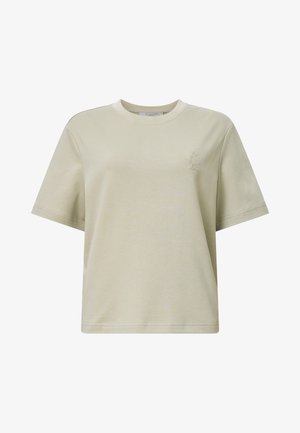 T-shirt en coton beige clair avec des manches courtes, un col rond, une coupe décontractée et un petit logo en relief sur la poitrine. Texture lisse.