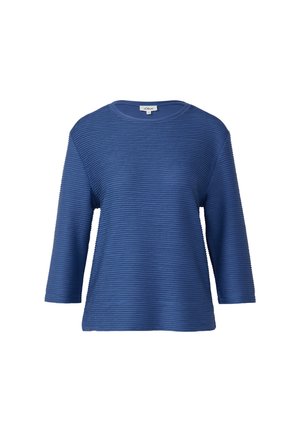 Chemise bleue avec un motif en relief texturé, un col rond et des manches jusqu'aux trois quarts. Fabriquée en un matériau doux et léger.