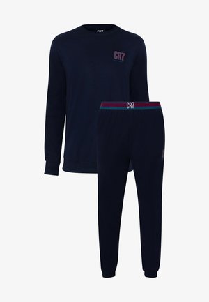 Set loungewear CR7 blu navy, composto da una maglietta a maniche lunghe con un piccolo logo e pantaloni abbinati con vita colorata e polsini elasticizzati.