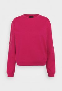 Sudadera de manga larga con cuello redondo en fucsia brillante, con puños y dobladillo acanalados, presentada sobre un fondo blanco liso.