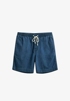 Shorts en denim bleu foncé avec taille élastique et lien de serrage blanc, dotés de poches latérales et d'un ourlet droit.