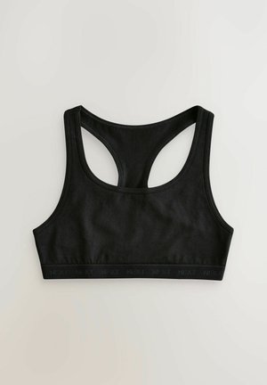 Svart sportbh i mjukt tyg. Har en racerback-design och ett brett elastiskt band med "NEXT"-logotypen längs nederkanten.
