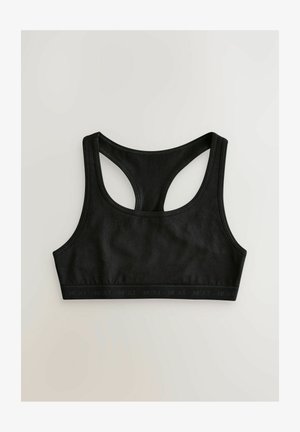 Sportivo nero realizzato in tessuto morbido. Caratterizzato da un design con schiena a corsetto e una ampia fascia elastica con il marchio "NEXT" lungo il fondo.