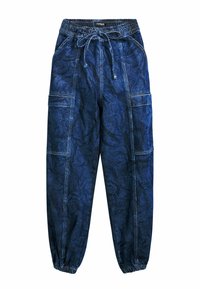 Blue denim jogger pants with an elastic waistband and drawstring, featuring multiple pockets and a wrinkled texture.