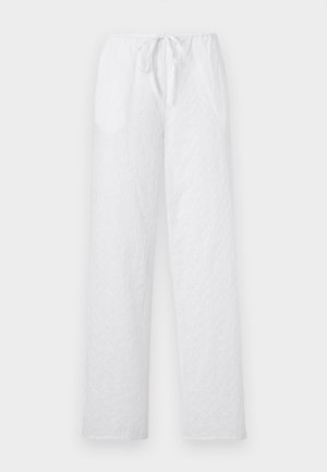 Weiße Hose mit weitem Bein, mit Lochstickerei, elastischem Bund und vorne Bindeband.