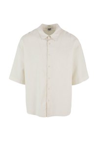 Camicia a maniche corte con bottoni, di colore bianco sporco, realizzata in tessuto leggero. Presenta un colletto classico e una vestibilità comoda con una texture liscia.