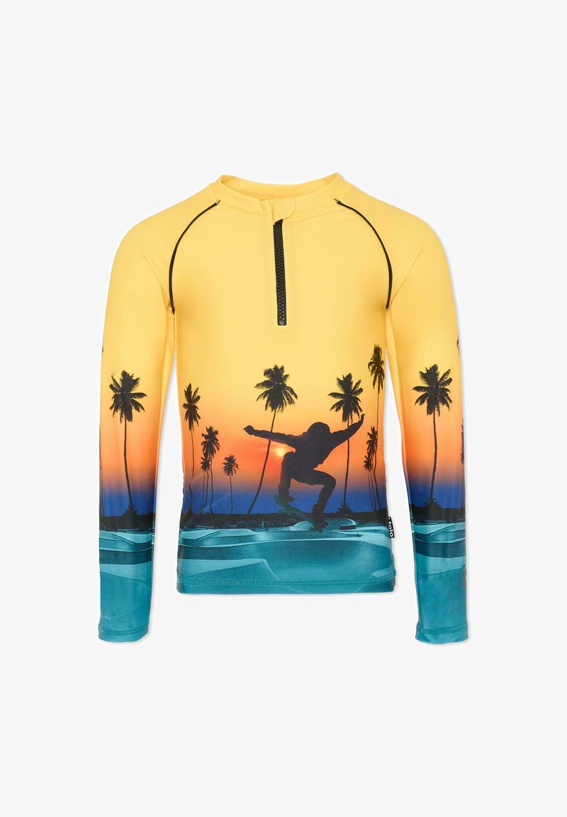 Langemouwen geel shirt met een zonsondergang strandscène, palmbomen, silhouet van een skateboarder en een rits aan de voorkant.