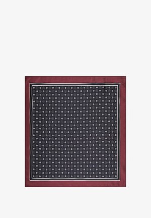 Jedwabny szalik w kolorze granatowym z białymi okrągłymi wzorami, obszyty bordową krawędzią i białym wykończeniem. Miękka tekstura w kwadratowym kształcie.