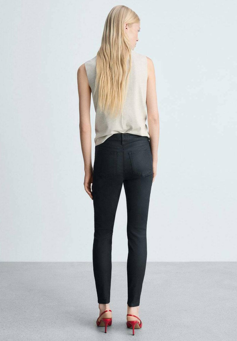 Jeans Skinny Noir Effet Wax MNG By Mango - Taille 4 Femme - Occasion Très Bon état