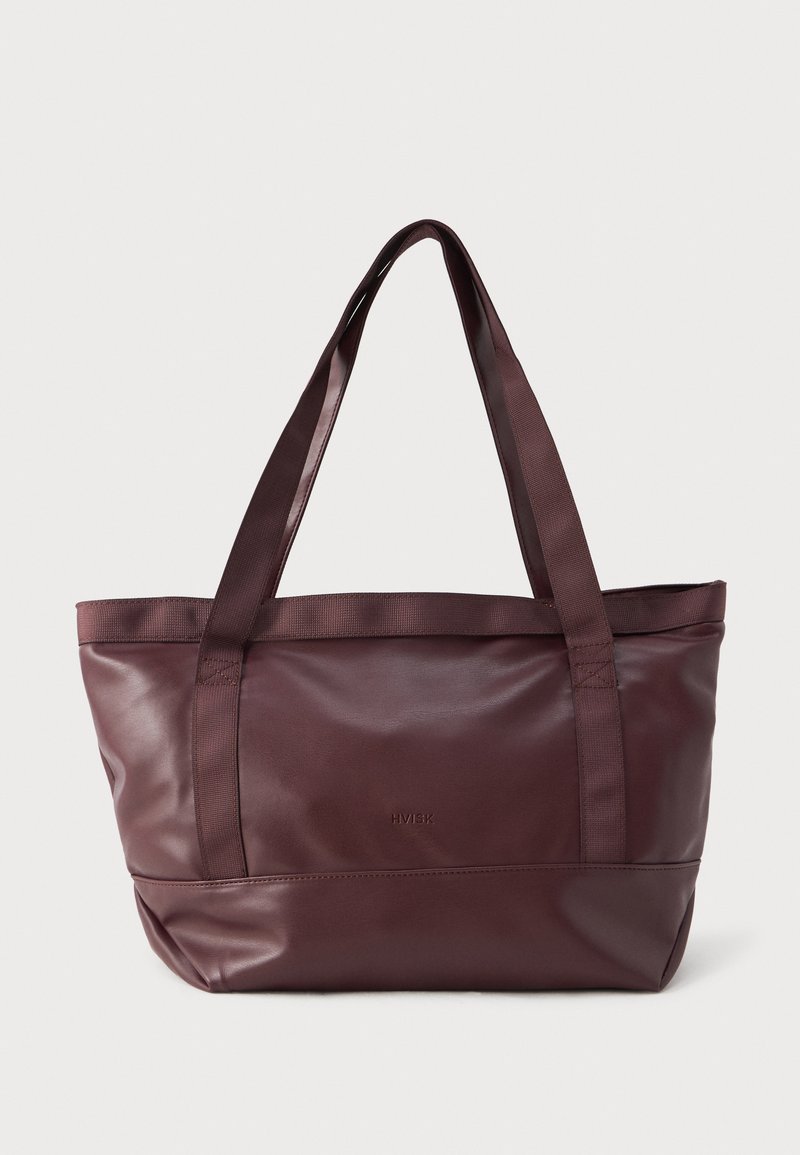 Velika temno rjava usnjena torba z dvema vlaknastima naramnicama in subtilno vtisnjenim imenom blagovne znamke na sprednji sredini.