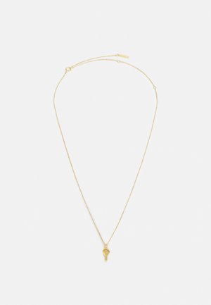 Gold necklace with a fine chain and a small, circular pendant resembling a key or charm, featuring a smooth texture and minimalist design.