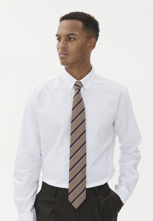 Matinique Tie - tannin