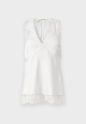 Valge varrukateta satiinist kämpsun pitskaunistusega V-kaelusel ja äärel, taga kaelusel paela kinnitusega.